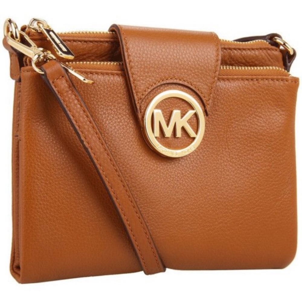 Well loved MK Fulton pebbled luggage Bag!
